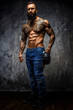 © Fxquadro - Full body portrait of muscular man.