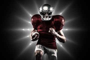 Composite image of american football player in red jersey 