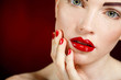 © GTeam - Studio portrait of a redhead female model.