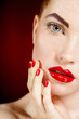 © GTeam - Studio portrait of a redhead female model.