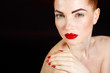 © GTeam - Studio portrait of a redhead female model.