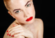 © GTeam - Studio portrait of a redhead female model.