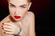 © GTeam - Studio portrait of a redhead female model.