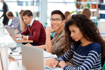 Canvas Print - Students studying in the university library