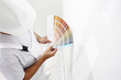 painter man with color swatches in your hand