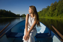 Young Beautiful Girl Posing On A Boat