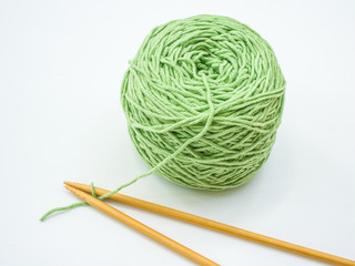 Green Knitting yarn isolated on white background