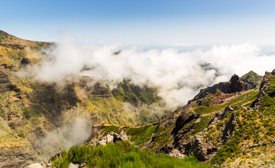 Wall Mural - Mountains in clouds landscape