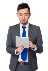 Canvas Print - Asian Young Businessman use of the mobile phone