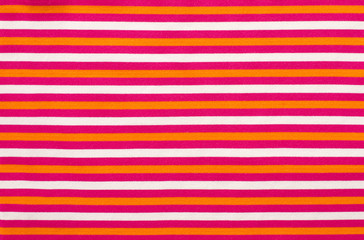 Wall Mural - Striped pink and orange with white textile pattern as a background. Close up on horizontal stripes material texture fabric.