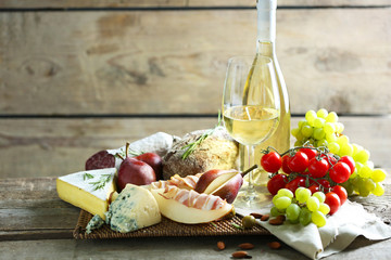 Fototapete - Still life with various types of Italian food and wine