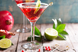 Fototapeta  - Pomegranate martini with lime