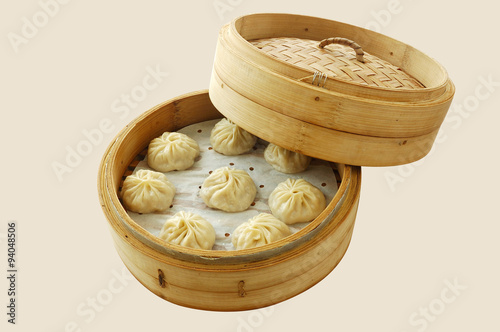 small steamer buns yumcha dim sum in bamboo steamer with chinese