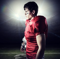 Poster - Composite image of sportsman holding helmet