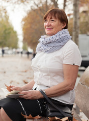 Wall Mural - woman  resting   in autumn     park.