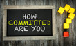 How Committed Are You? written on chalkboard