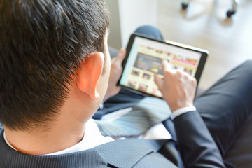 Wall Mural - Businessman using tablet computer