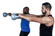 © WavebreakmediaMicro - Strong friends lifting kettlebells together