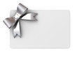 Blank gift card with silver ribbons and bow concept isolated on white background