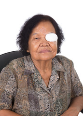 medicine plaster patch on old woman injury wound eye