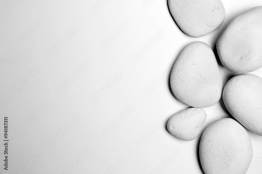 Spa stones on white background