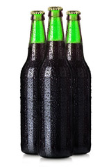 Wall Mural - Set of beer's bottles with frosty drops isolated