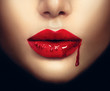 © Subbotina Anna - Sexy vampire woman lips with dripping blood
