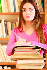 Wall Mural - Girl student in college library