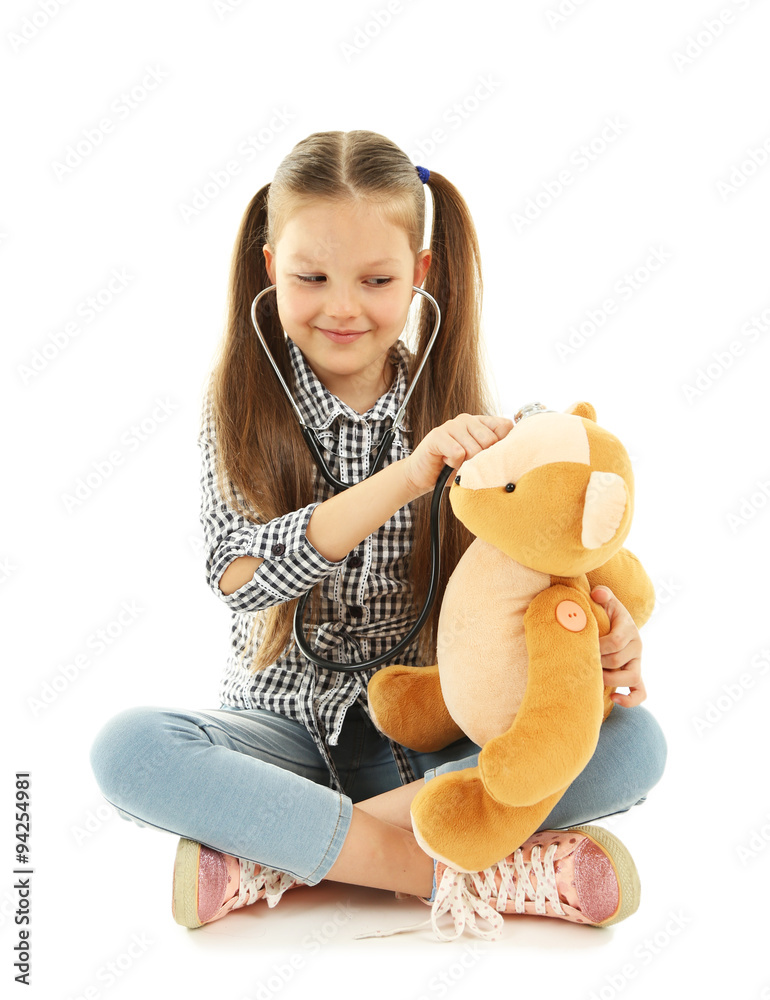 Beautiful little girl with teddy bear, isolated on white