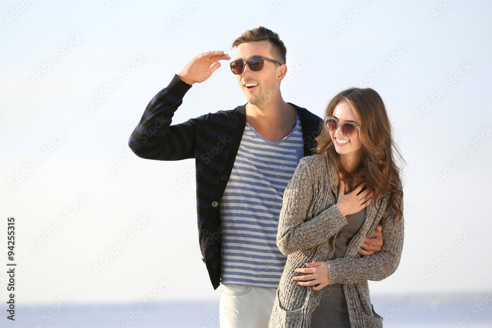 Young couple on the riverside
