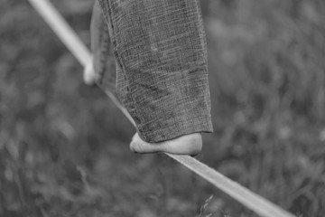 Slackline in the park. Black and white