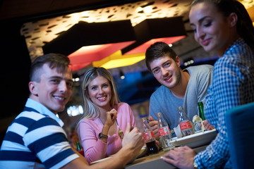 Wall Mural - friends have lanch break in shopping mall