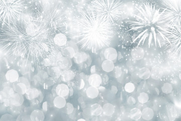 Wall Mural - Abstract holiday background with fireworks and sparkling lights