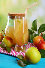 Poster - Fresh pear juice with fruit on bright background