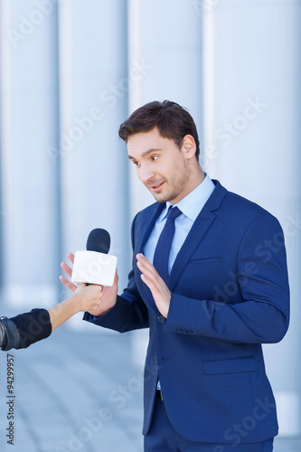 Fotografia, Obraz Young gentleman is not willing to speak.