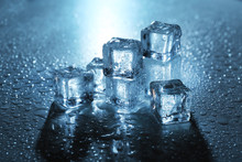 Melting Ice Cubes Under Blue Light, Close Up