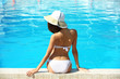 © Africa Studio - Young woman enjoying in swimming pool at summertime