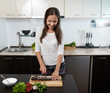 © Аrtranq - girl in the kitchen cook dinner