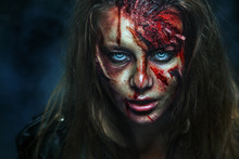 Close-up Portrait Of Horrible Zombie Woman. Horror. Halloween 