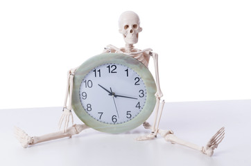 Wall Mural - Skeleton with clock isolated on white