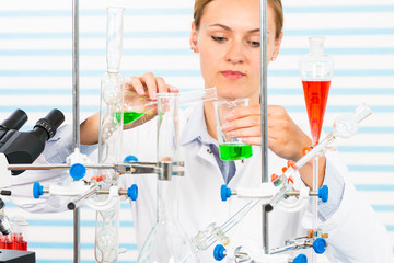 Poster - Chemical laboratory scene: attractive young  student scientist o