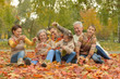 © aletia2011 - Family relaxing in autumn park