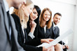© baranq - Business meeting. Group of professionals reading cv. Job interview