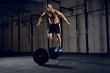 © baranq - Men jumping over barbells