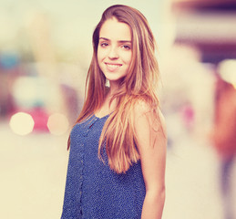 Wall Mural - young woman smiling over white background