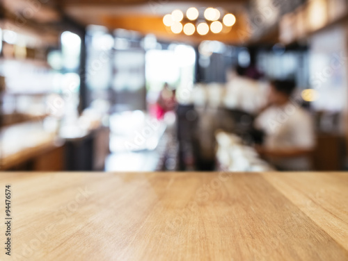Fotografía Table top counter with customer interior Retail shop background