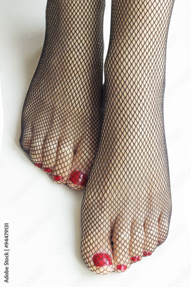 Woman feet with fishnet tights isolated on white background Stock Photo | Adobe Stock Woman feet with fishnet tights isolated on white background Stock Photo | Adobe Stock