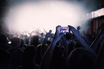 silhouettes of a crowd party concert music happy