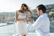 © sergiubirca - Handsome man doing a marriage proposal on bright sunny day on vacation