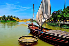 Wooden Boats Anchoring On River In Hoi An District, Quang Nam Province, Vietnam